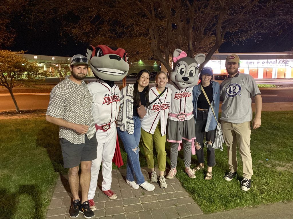 group of friends with Nutzy and Nutasha, The mascots of the Richmond Flying Squirrels baseball team | Things to do in Richmond