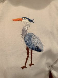 Blue Heron embroidered on a shirt
